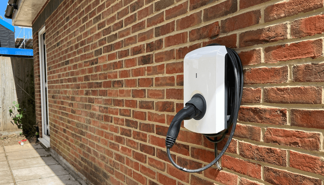 Electrician installing EV charger